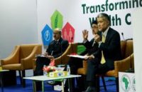 Dr. Takao Toda, Vice president in charge of TICAD, JICA speaking on the importance of triangular cooperation among Japan, India and Africa at the panel this morning. behind from right - Mr. David Rasquinha, managing Director of Export-Import Bank of India next to Mr. Moriyuki Aida, JBIC Executive officer for Europe, the Middle East and Africa who is in the middle.- Photo- newBusinessEthiopia.com